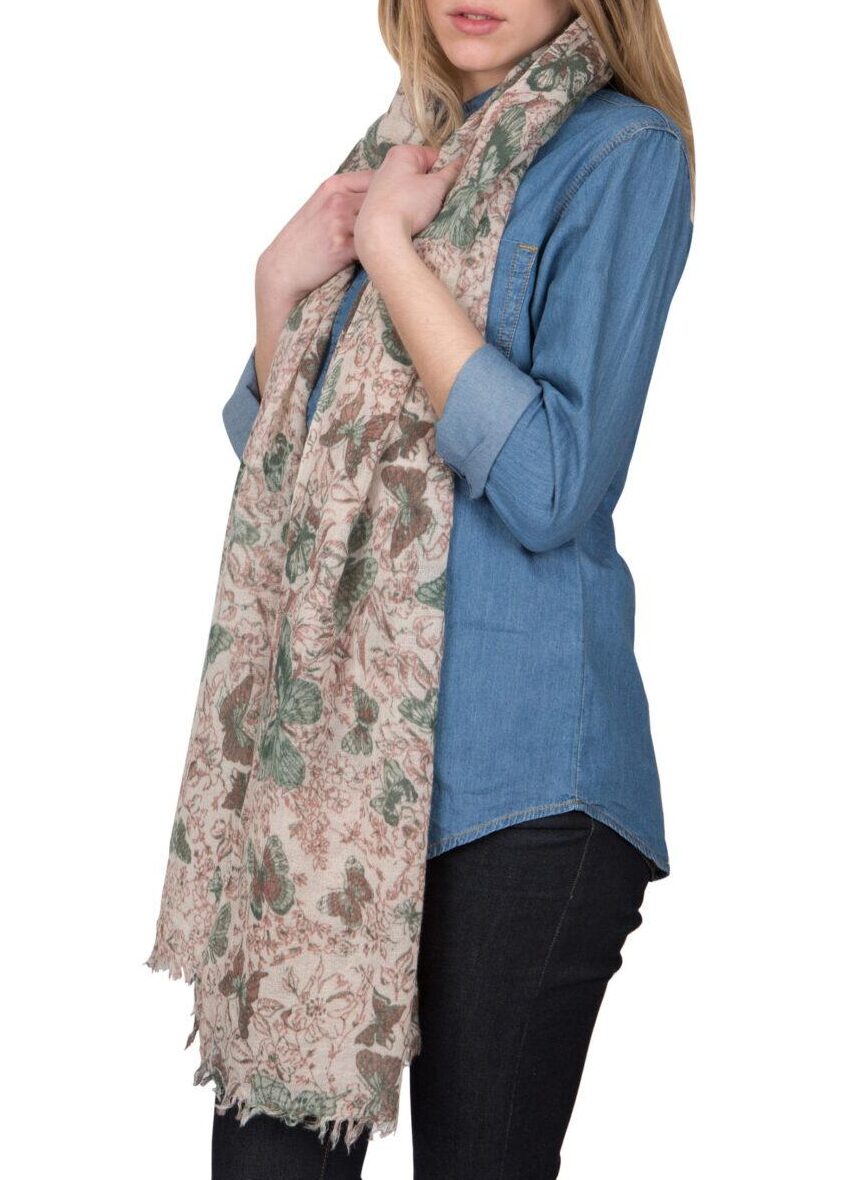 Add some fun to your winter wardrobe with this butterfly printed wool scarf